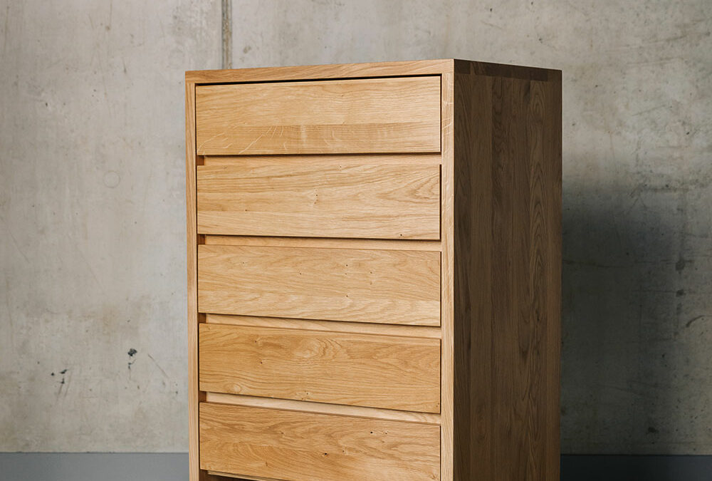 A Black Lotus solid oak bedroom storage chest with 5 drawers