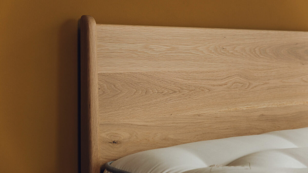 A closer headboard view of the Camden mid century style bed here made in solid oak wood