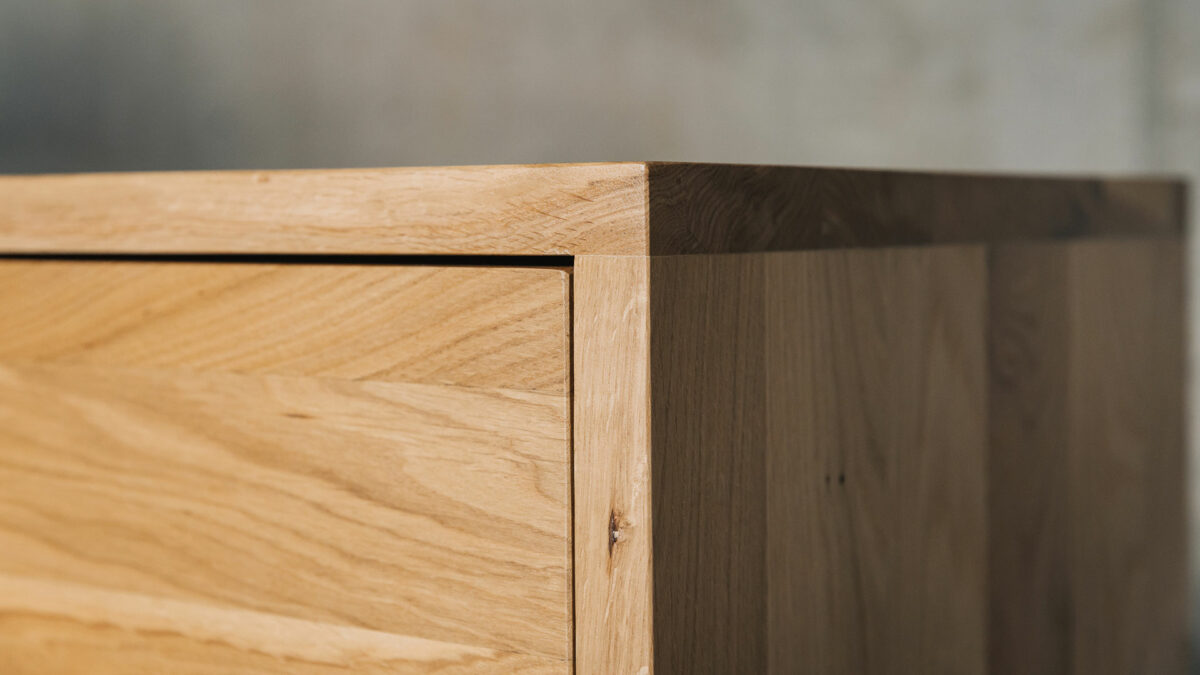 A close up photo of our Cube solid oak bedroom storage chest