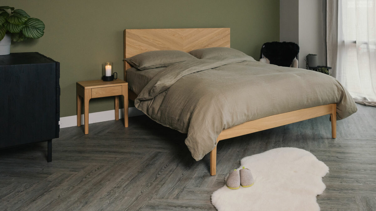 Olive green bedding set shown on an Oak Highbury bed