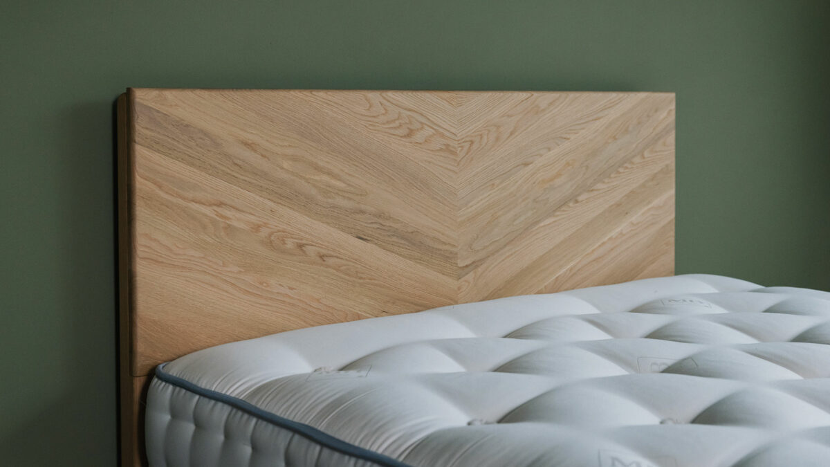 a view of the headboard of our chevron patterned oak Highbury bed