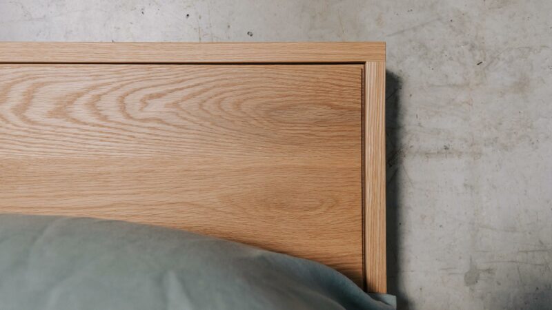 Hand made in solid oak - the headboard of our Leith bed shown close up