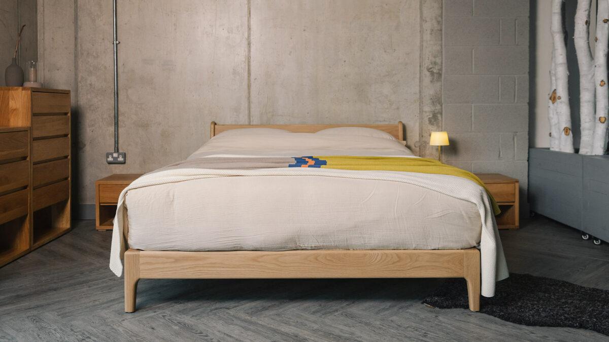 oak Pimlico bed with lime colour block throw