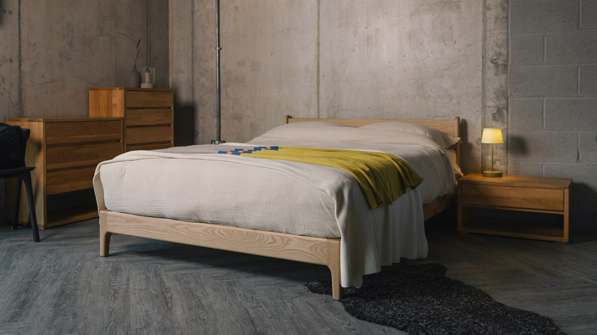 Bedroom storage chests of drawers made from solid oak and shown with our low Pimlico bed