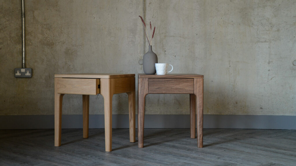 solid wood bedside tables with storage drawer shown in oak and walnut