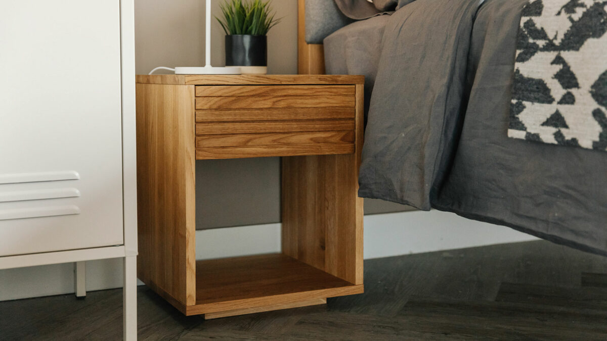 oak bedside table with grooved drawer front detail