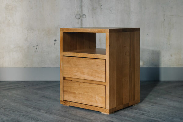 A Cube solid oak bedroom storage chest with 2 drawers and an open shelf