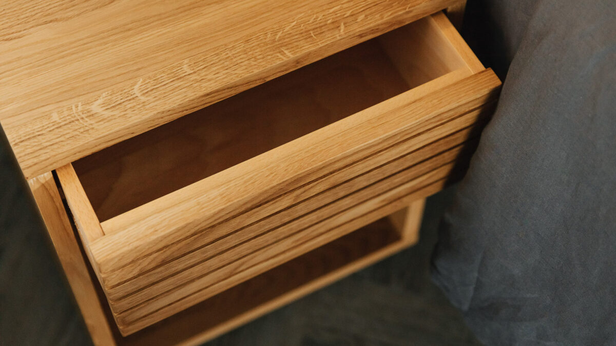 oak bedside with grooved drawer front