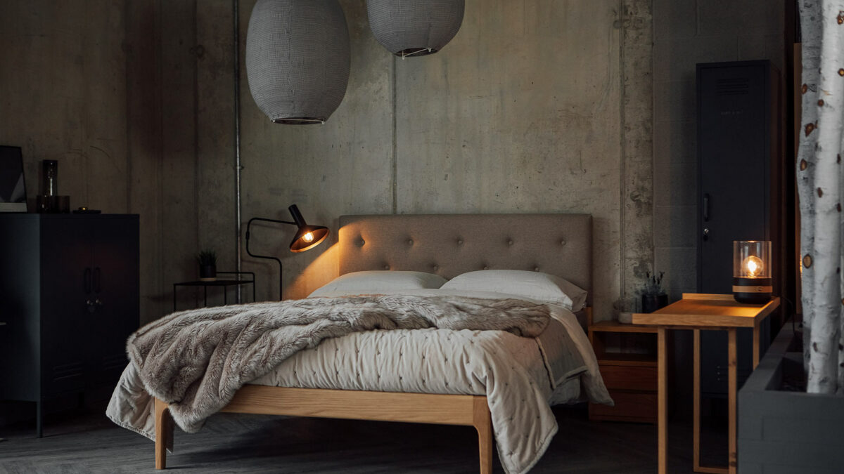 Industrial bedroom style made cosy with our upholstered headboard Bloomsbury bed in oak.