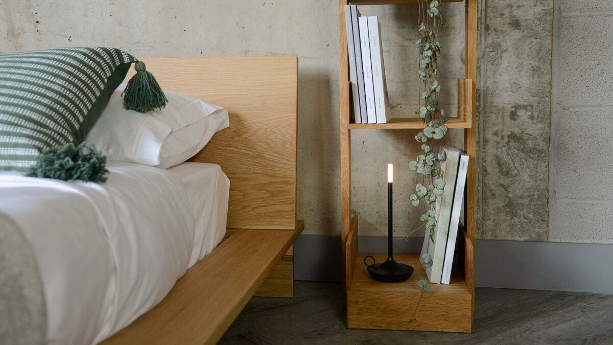 close up view of the bottom shelf of our freestanding oak bookshelf