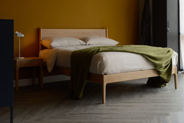 oak camden bed with green bedspread