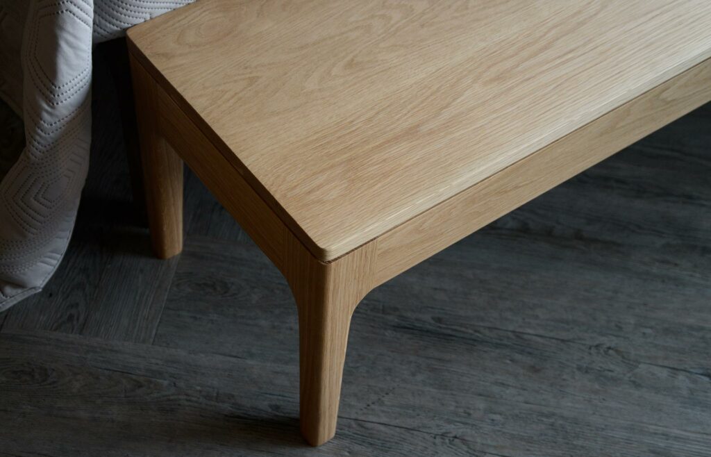 a close up view of the solid oak Camden bench