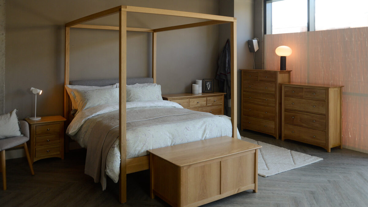 Classic oak storage chests collection shown with our Highland 4 poster bed