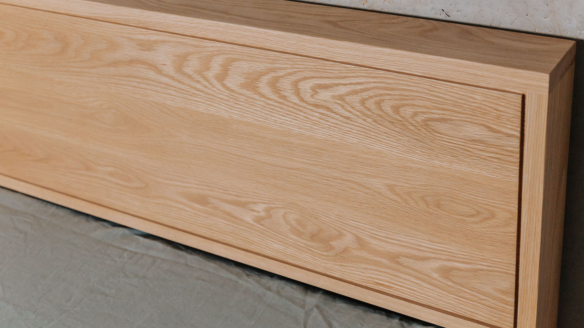 a closer view of the Headboard of our hand crafted solid oak Leith bed