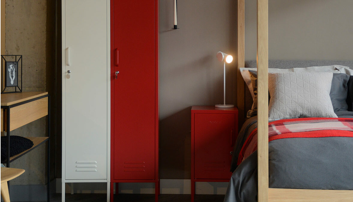 storage lockers in ivory and red shown with our Highland 4 poster bed