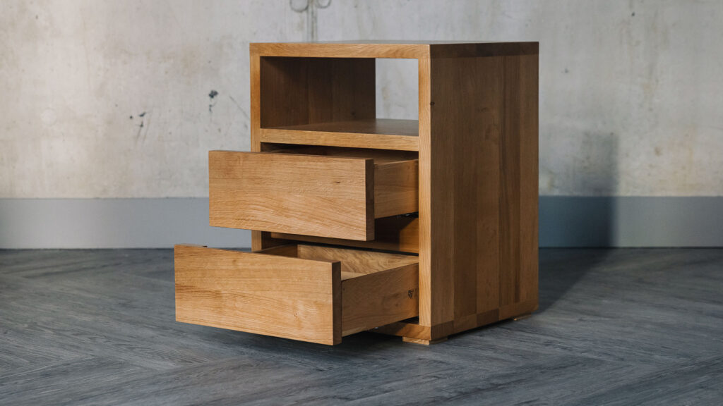 oak nightstand with open drawers and upper shelf