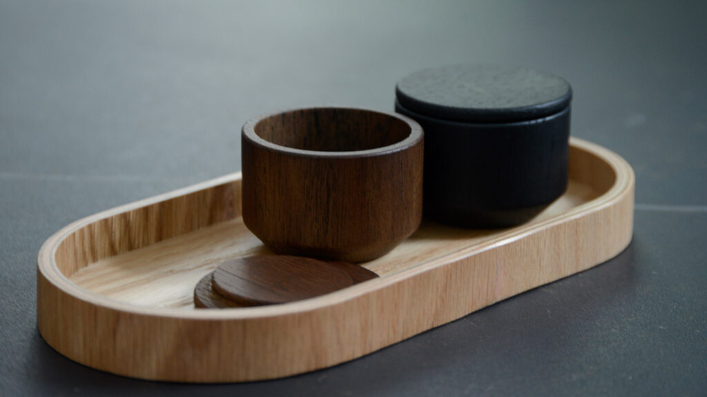 oak salt pots in smoked and black in oak tray