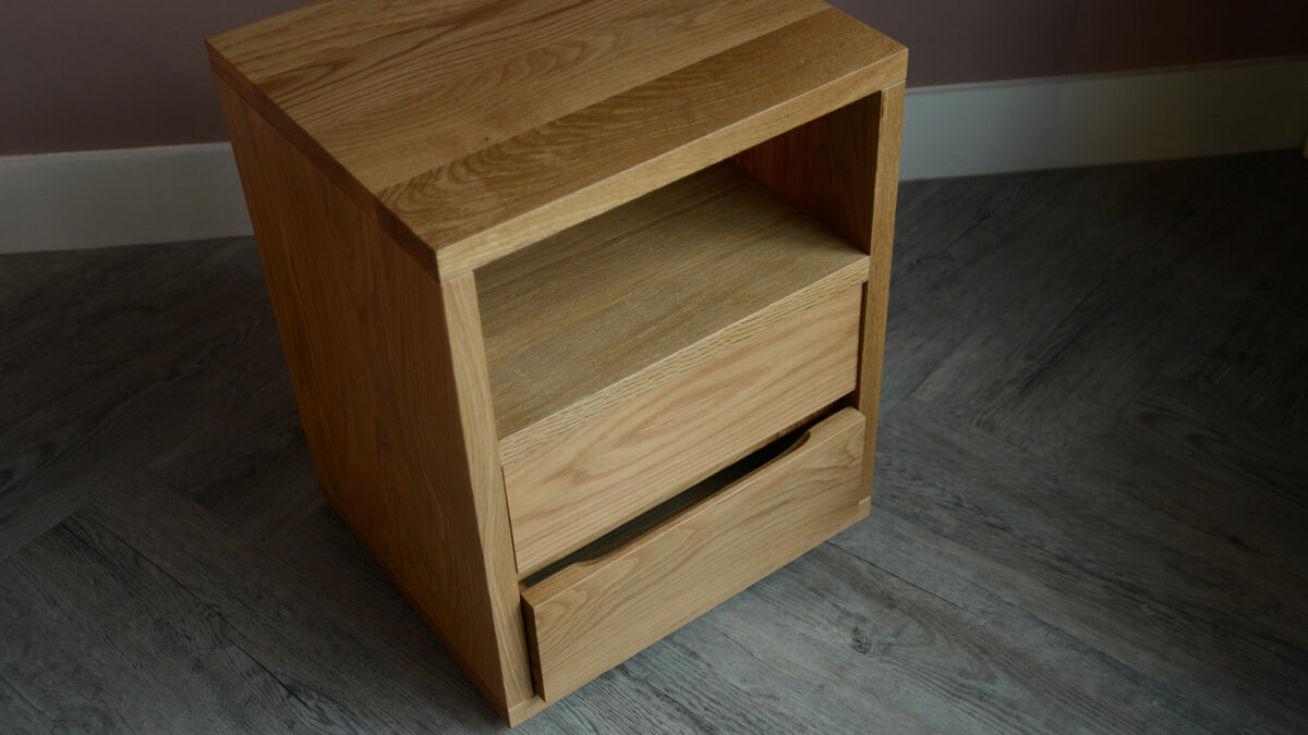oak shelf table from above open bottom drawer