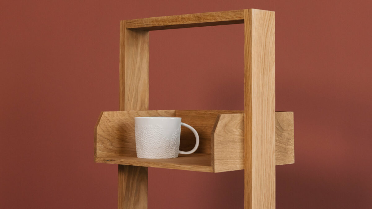 oak shelf unit detail with embossed mug