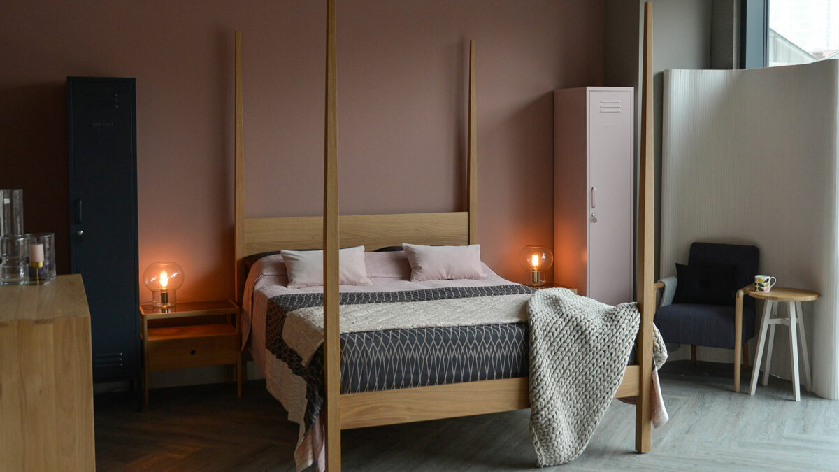 Hatfield tall 4 post wooden bed made in UK from sustainably sourced wood.