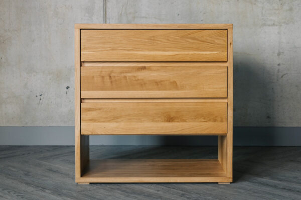 Bedroom storage chest with 3 drawers and open low shelf and made from solid oak