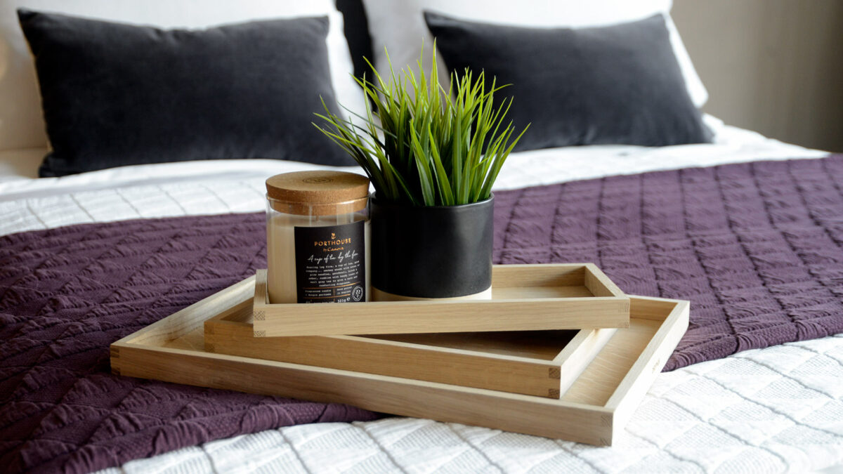 oak trays stack on stockholm bedspread