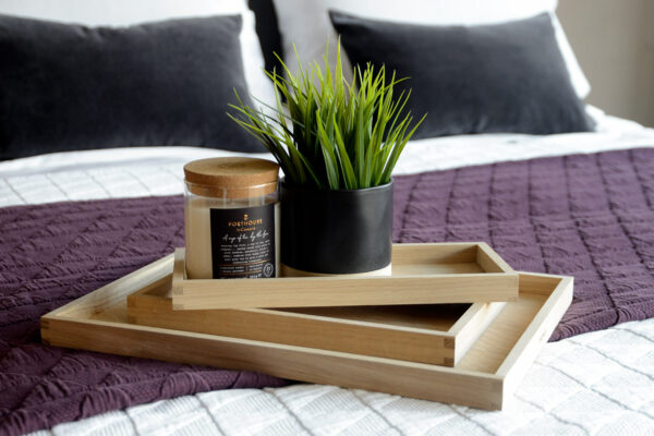 oak trays stack on stockholm bedspread