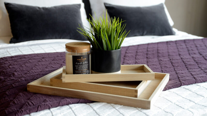 oak trays stack on stockholm bedspread