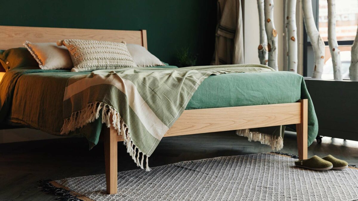oak zanskar with olive throw and green linen bedding