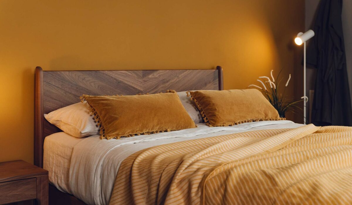 ochre accessories on walnut Hoxton bed
