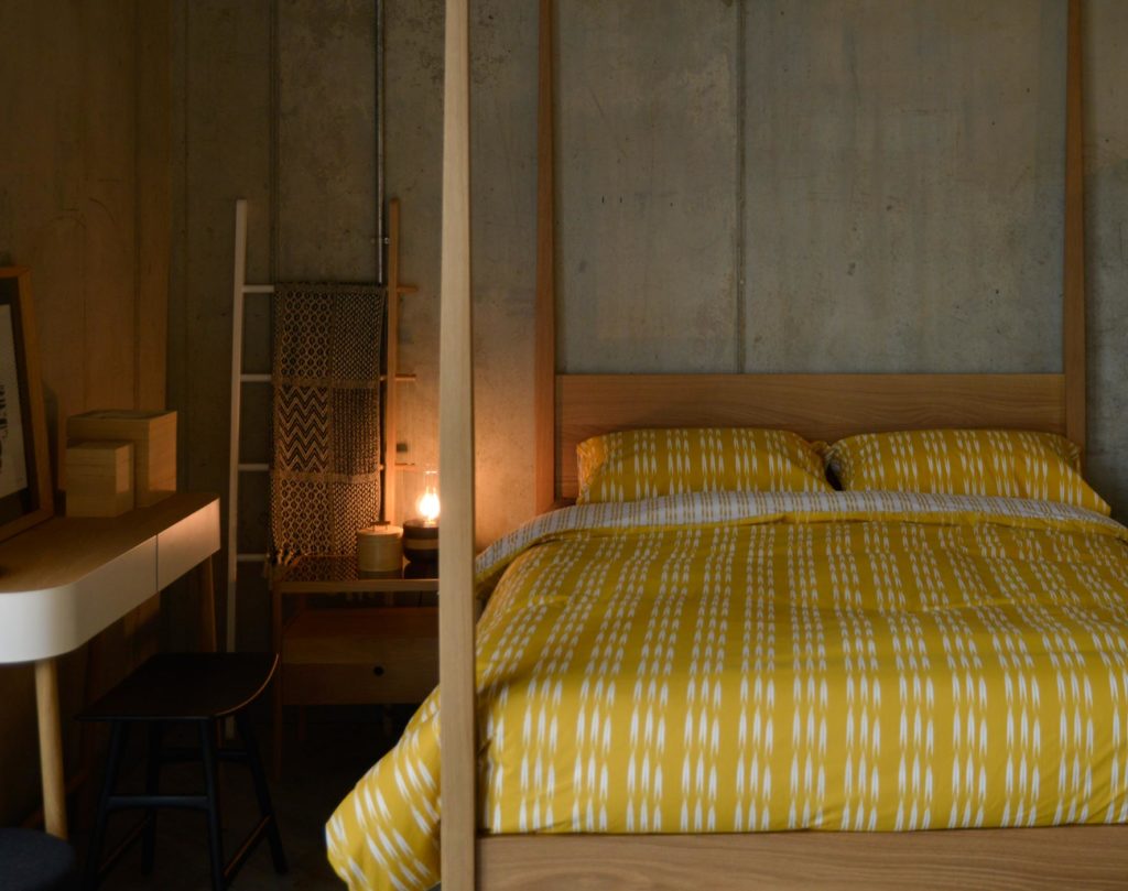 ochre bedding shown on our Hatfield wooden 4 poster bed made in Oak