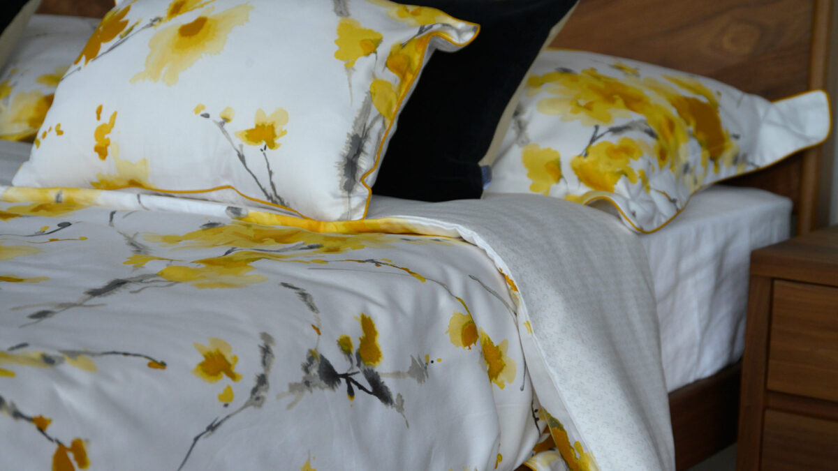 ochre painted flowers cushions