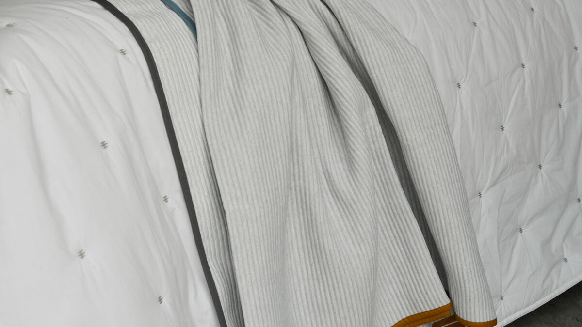 off white ridged bedspread coloured edging