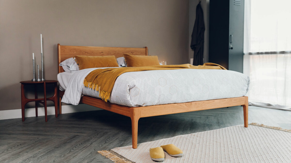 mid century style cherry wood Camden bed shown in Kingsize and with an oiled finish