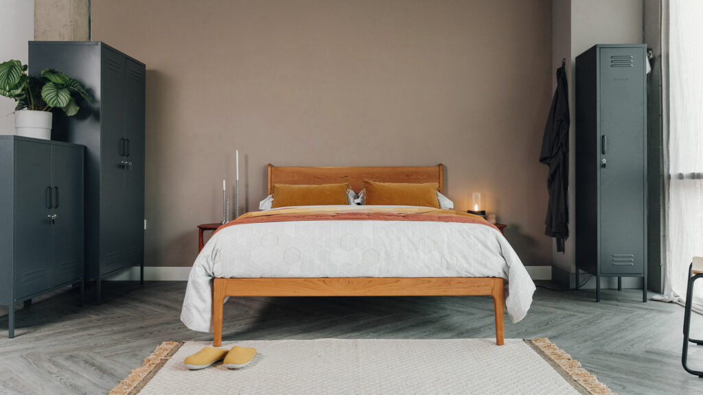 a rich red toned cherry wood Camden bed with an oiled finish for a mid-century style