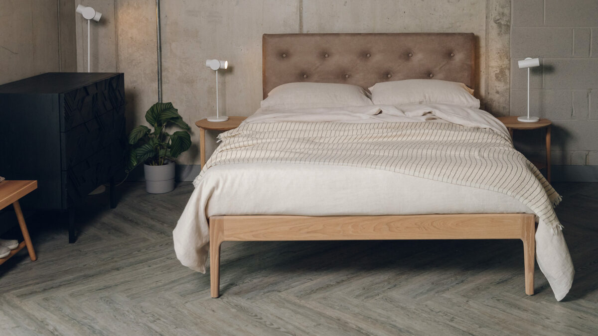 soft naturals look, ecru linen bedding with light striped throw shown on our oile oak Bloomsbury bed with upholstered headboard