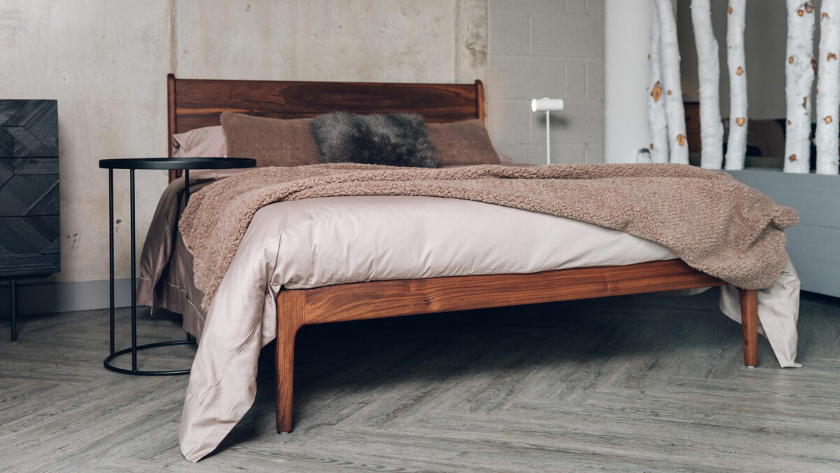 rich oiled finish walnut Camden bed with stone colours bedding