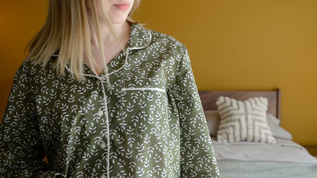 lightweight cotton pjs with a block print leaf design in olive green and white and with contrast trim to the collar and cuffs