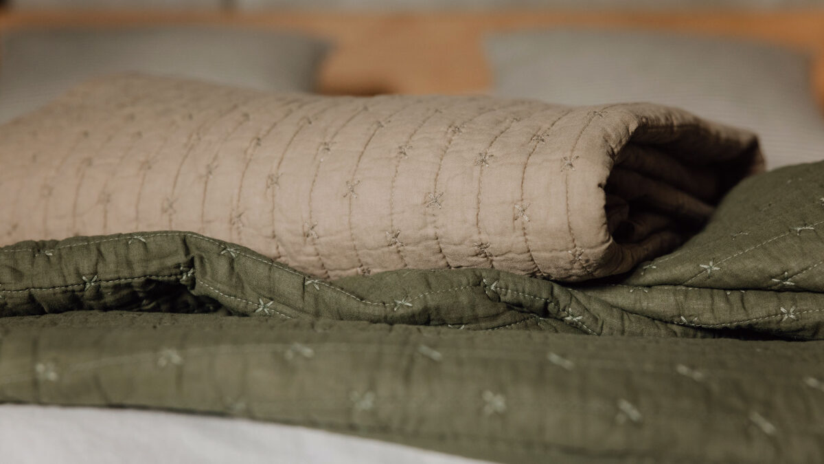 olive and stone quilted throws