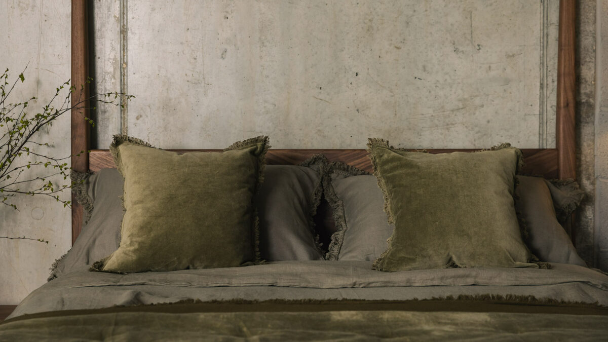 olive bedding with fringe detail