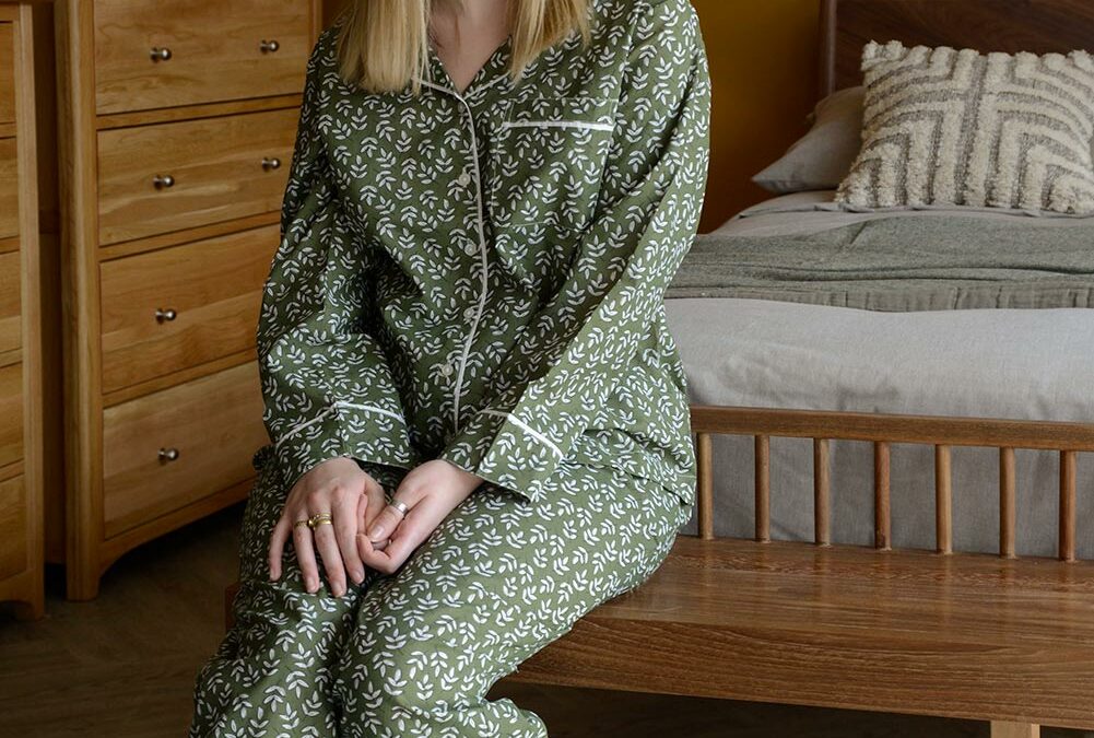 lightweight cotton pyjamas with a block print leaf design in olive green and white and with contrast edging to the cuffs