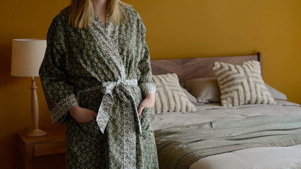 lightweight cotton robe with a block print leaf design in olive green and white and with contrast belt and cuffs