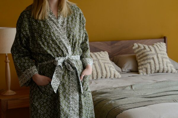 lightweight cotton robe with a block print leaf design in olive green and white and with contrast belt and cuffs