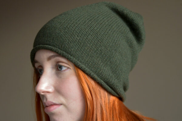 olive green Italian made cashmere beanie hat shown worn