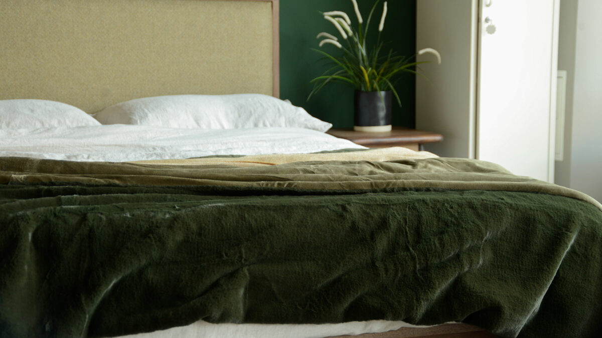 softest luxury faux fur bed throw in deep olive green