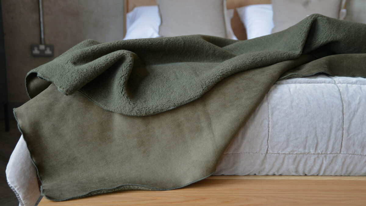 olive green reversible faux sheepskin throw