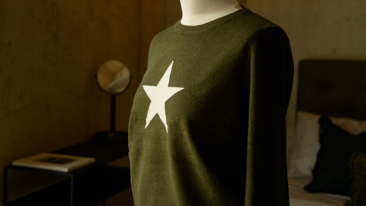 olive jumper with ivory star