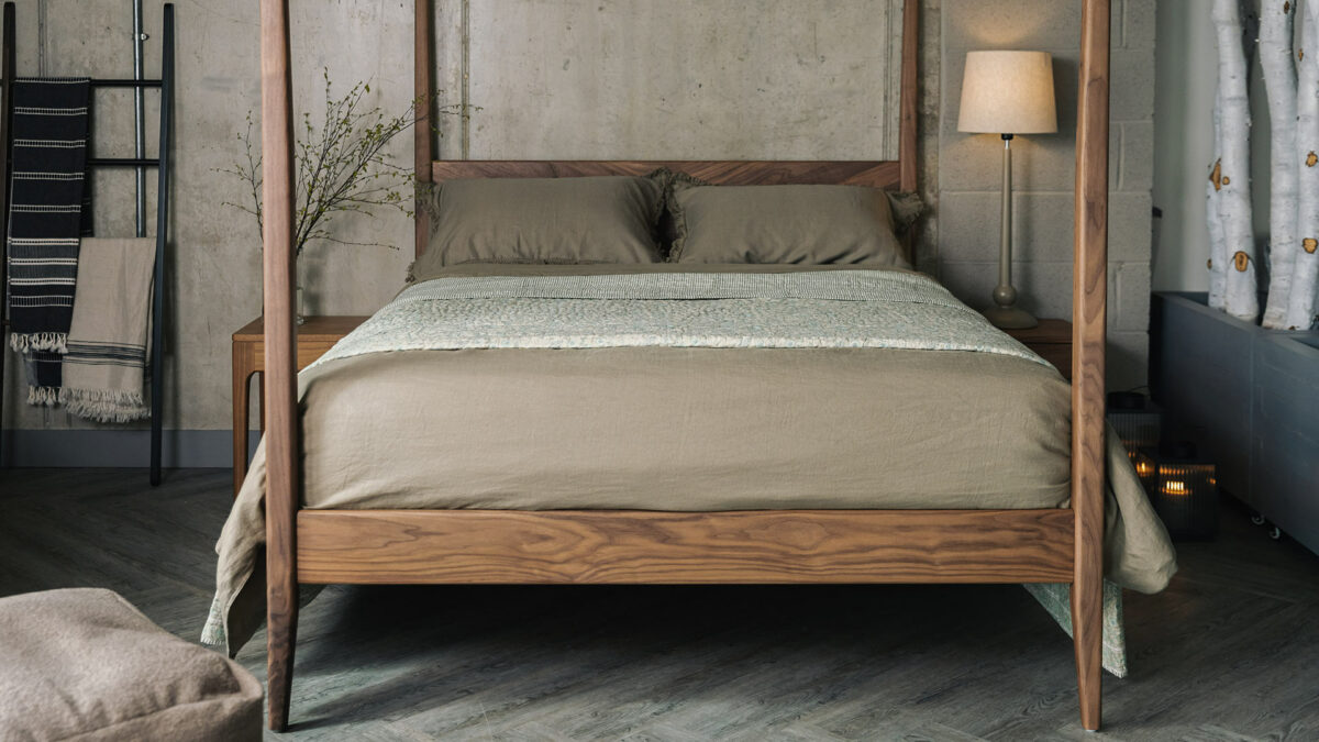 olive linen bedding on walnut 4 poster