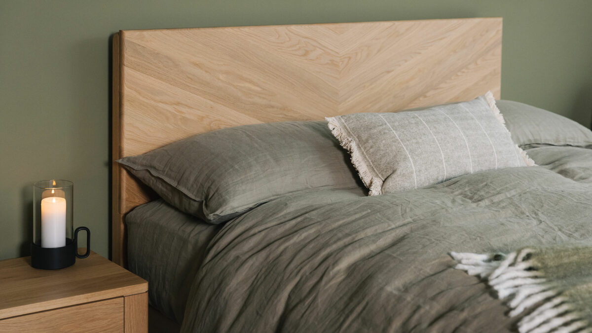 olive linen with sage stripe cushion on oak Highbury bed