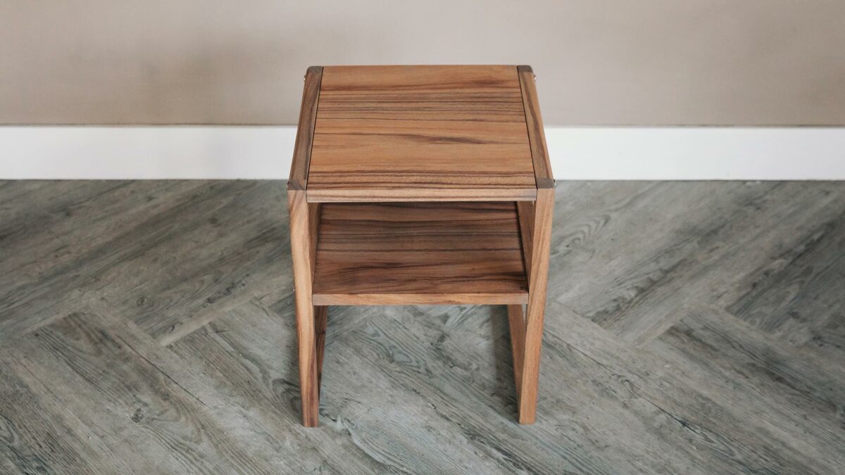 wooden bedside table with open shelf